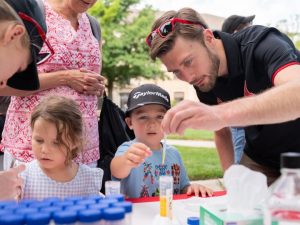 UNL East Campus Discovery Days 1 Discovery Days East Campus kids do an experiment with Dad.